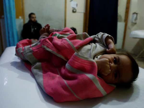 An Infant in Need of Milk and Baby Supplies