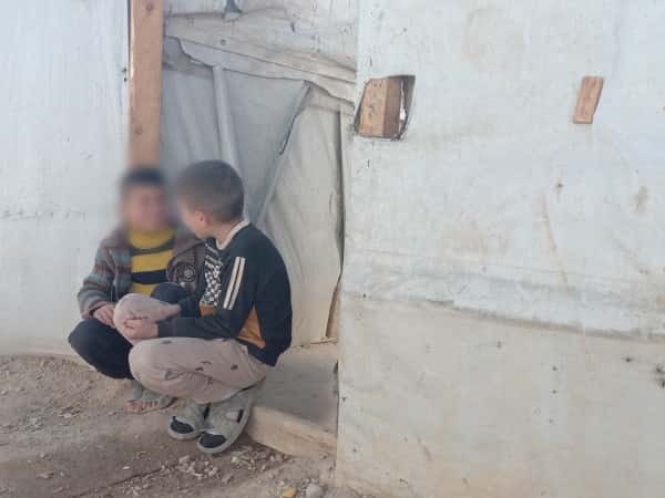 Displaced family to IDPs camps in Lebanon needs heater and food