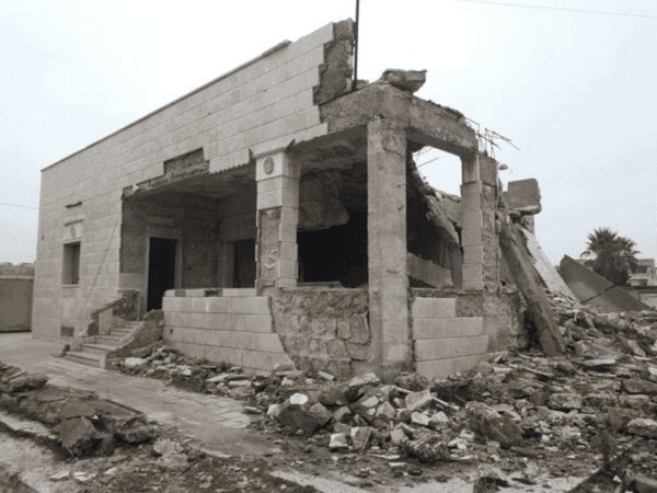 A family lives in a room of a destroyed house!