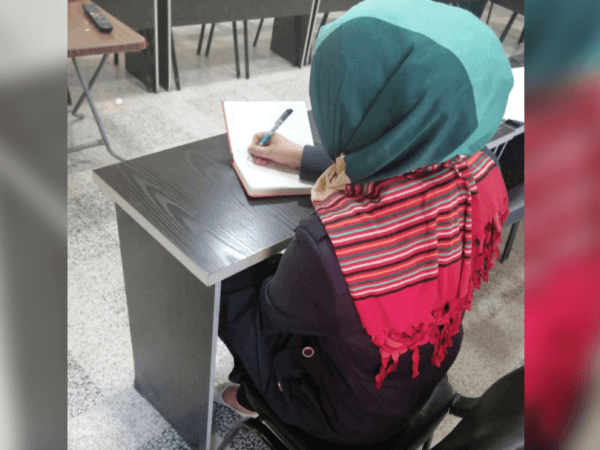 a young woman suffers from hearing impairment
