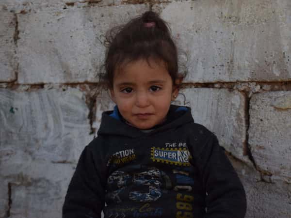 An orphan girl from the city of Aleppo