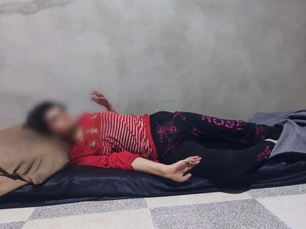 A girl suffering from paraplegia and mental retardation, needs an electric wheelchair and health supplies as soon as possible