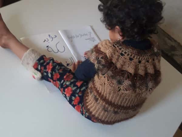 Laila is an orphan child from Latakia