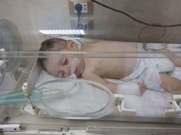 Ammar suffers from a hole in his heart and needs urgent surgery.