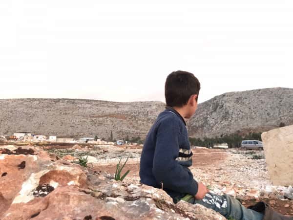 Qatada is a child from Aleppo