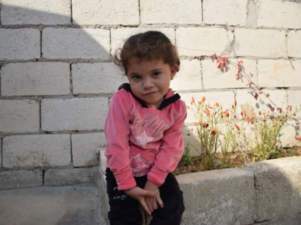 Little Ahlam is an orphan from the city of Idlib.