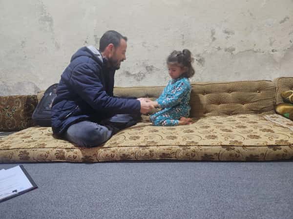 A little girl in urgent need of help