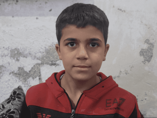 Mahmoud, an orphan child from the city of Idlib.