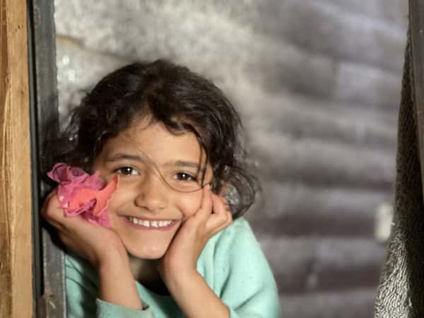 A child suffering from pain and stunted growth!