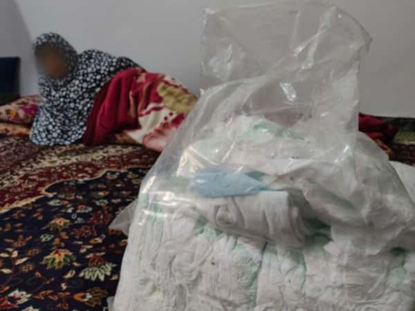 Between illness and the weight of burdens.