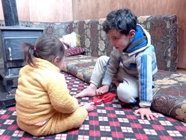 A family lives in a tent and is in dire need of food.