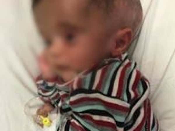 A baby, needs treatment expenses.
