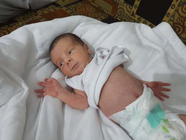 A new born baby fighting to breath!