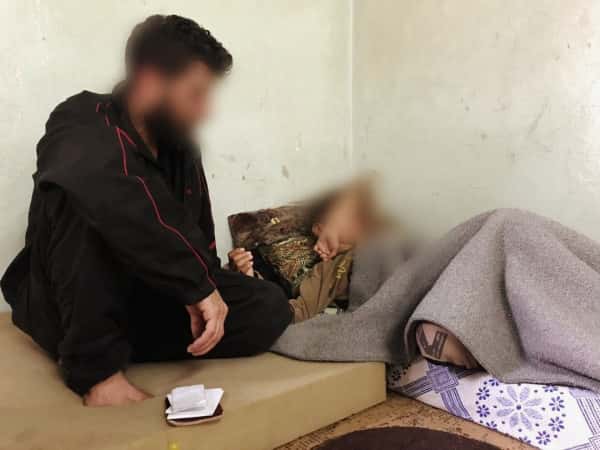 Two kids sell biscuits to maintenance their family .