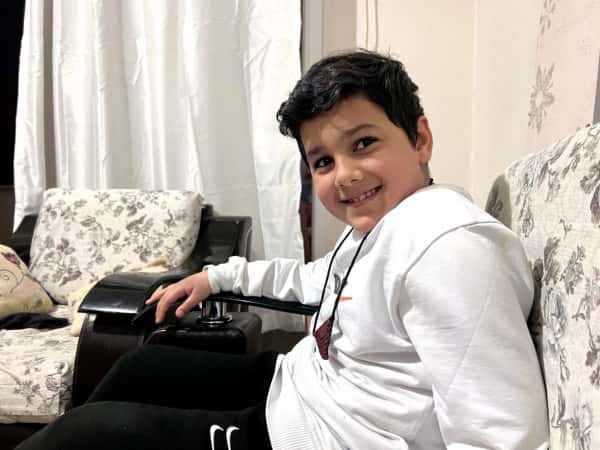 Khaled is a child orphaned by the earthquake.