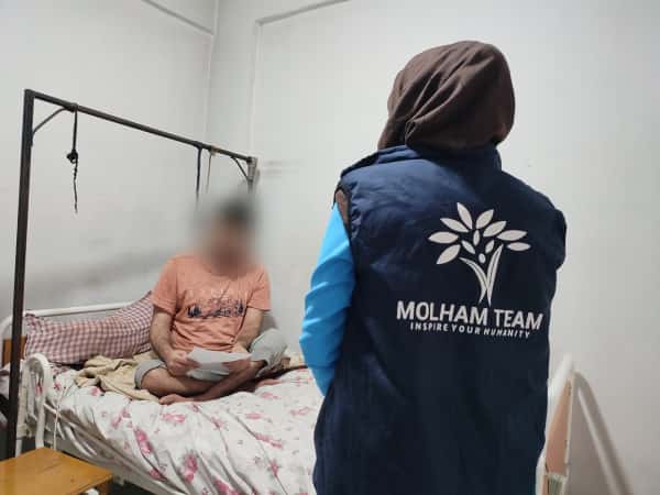 Like many young men, Ali was wounded in a war and is now bedridden.