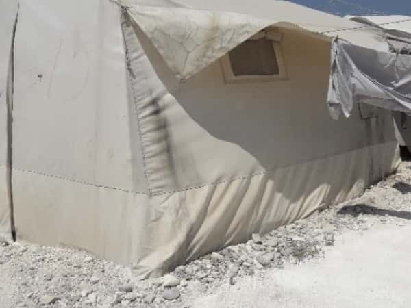 In a poor tent , a family waits your support