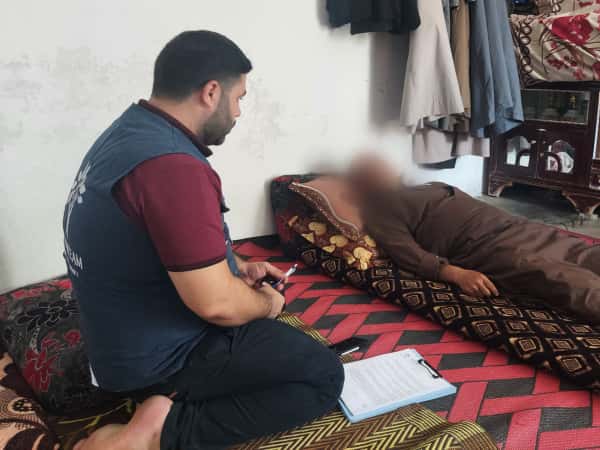 A herniated disc has left Uncle Mohamed bedridden.