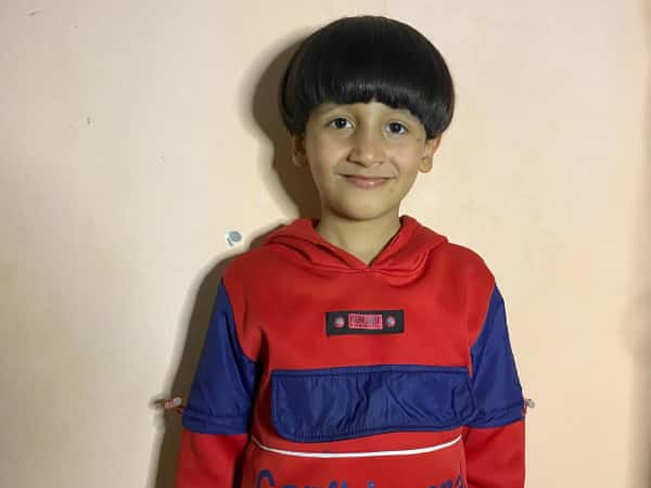 Karim, an orphaned boy from Gaza.