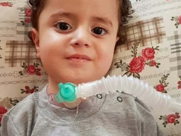 A child needing a respirator