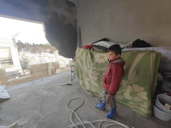 A house suspended between danger and debt