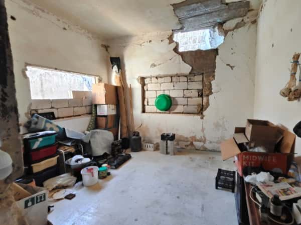 A burdened life and a cracked roof