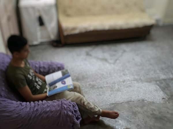 A kid with hearing impairment