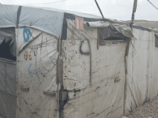 A young woman lives in a tent that needs repair!