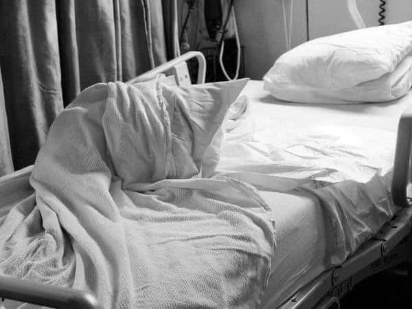 Young woman suffers from thyroid gland swelling