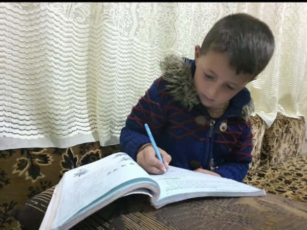 Muhammad is orphaned child and needs your support
