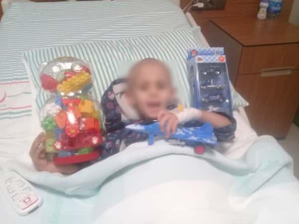 A child suffers from bowel cancer.