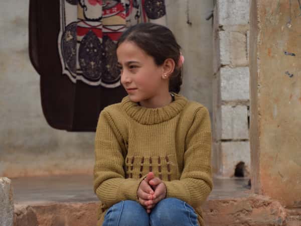 Rawan, a child orphaned by the earthquake.