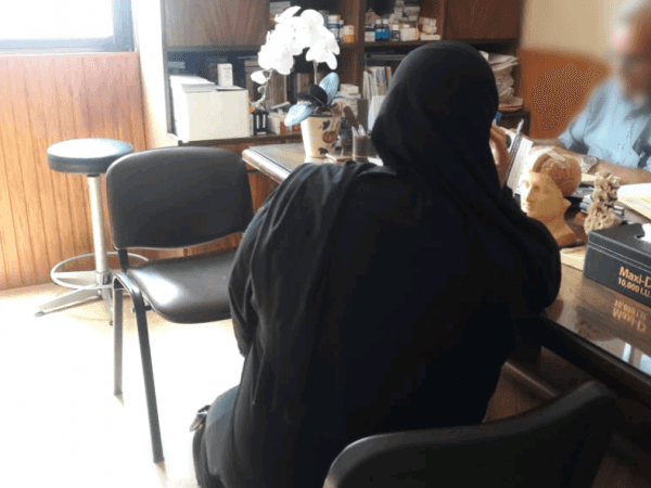 A woman suffers from paralysis