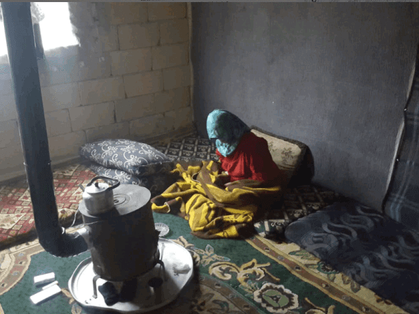 An elderly woman lives in a wretched house!