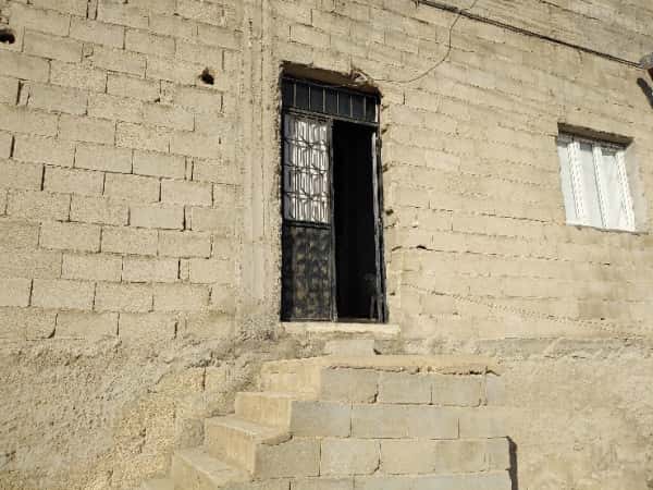 A family lives in an inhabitable  warehouse