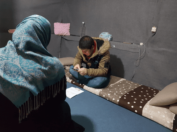 A young woman lives in a tent that lacks many necessities