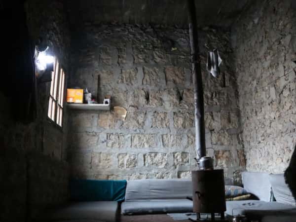 They live in a destroyed house, and the girl needs surgery