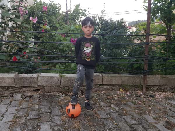 Mohammed is an orphan who loves football