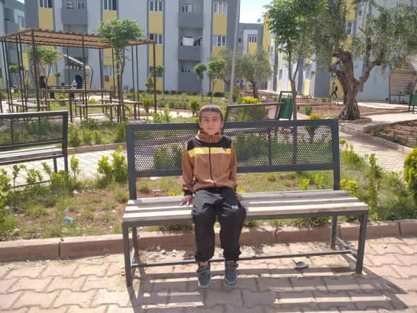 The orphaned child, Omar, is in need of your help.