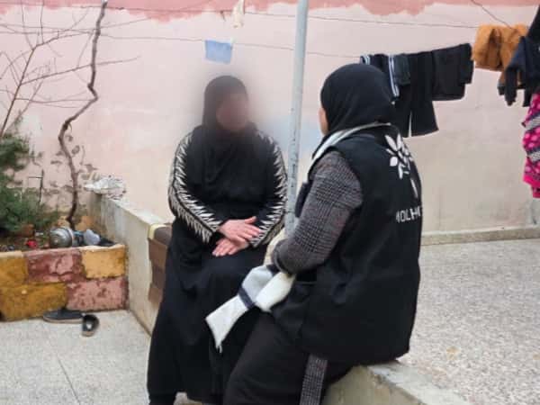 A mother teaches patience to her children