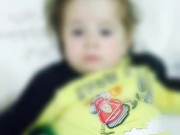 A kid suffering from shortness of breath